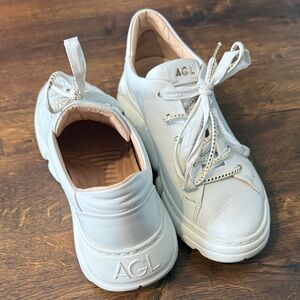 AGL White Leather Double Lace-Up Platform Sneakers with Gold Accents